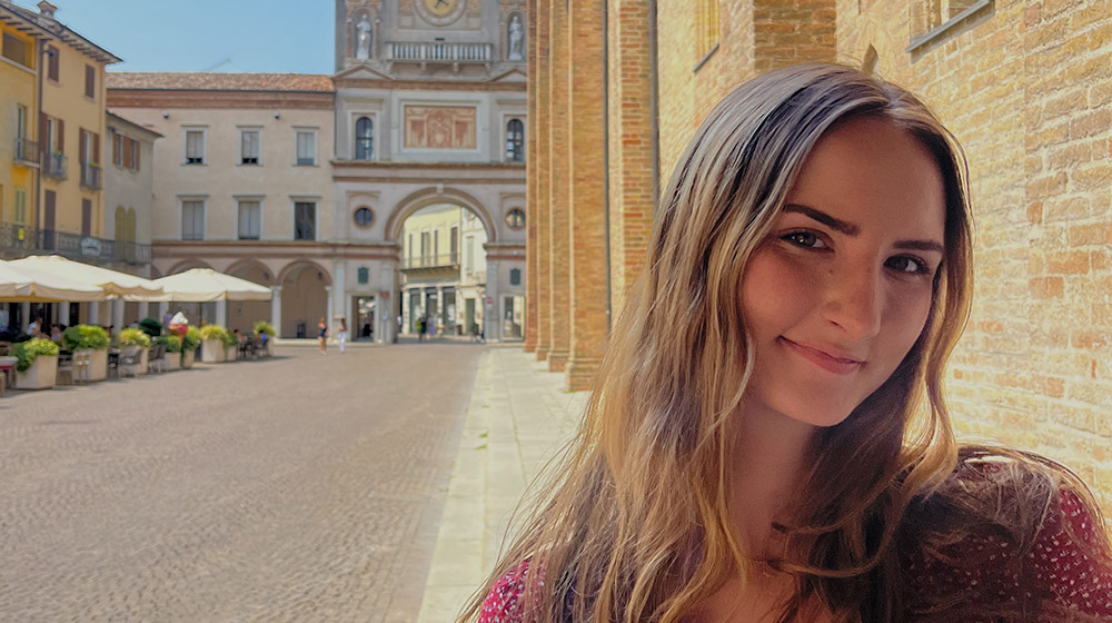 Erin Flannigan outside historic building in Europe